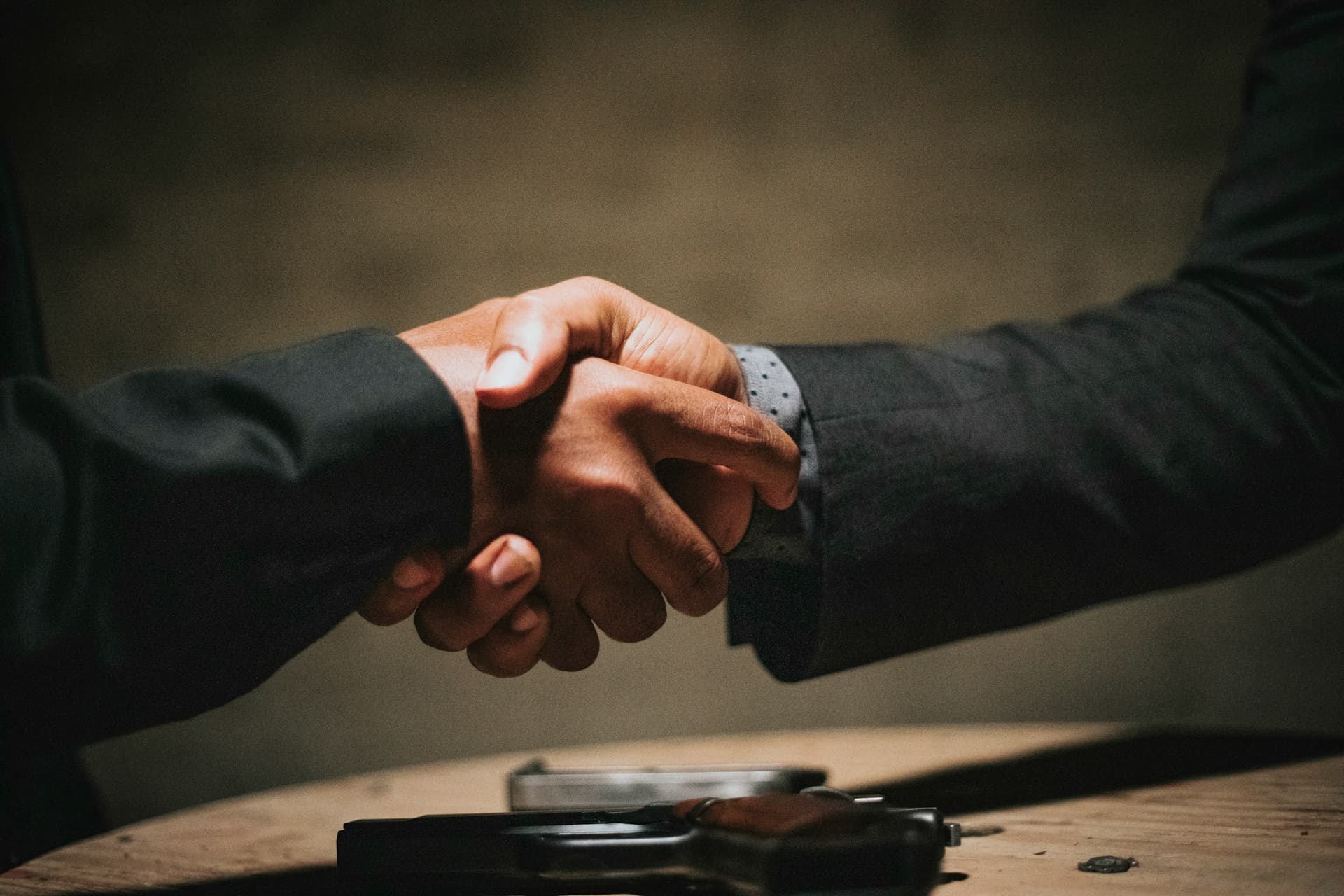 Business partners shaking hands over a commercial agreement