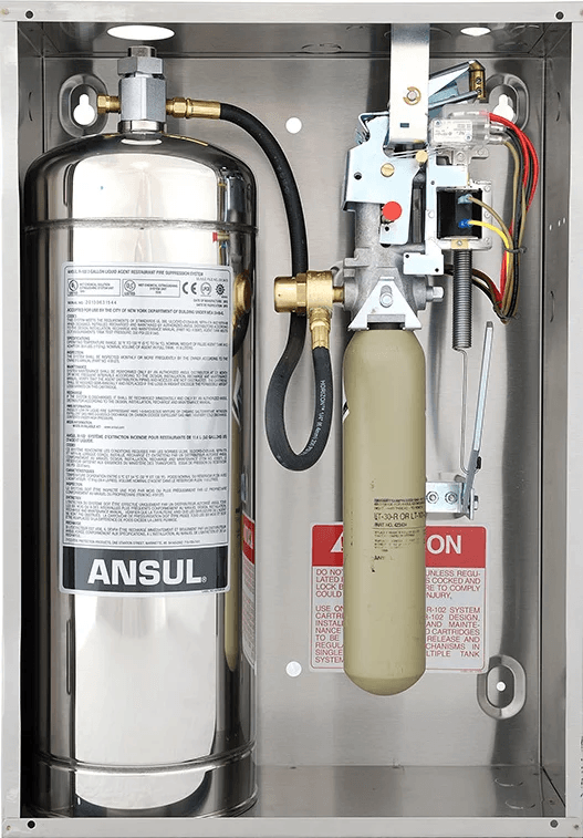 Ansul R-102 commercial kitchen fire suppression system components in a stainless steel enclosure