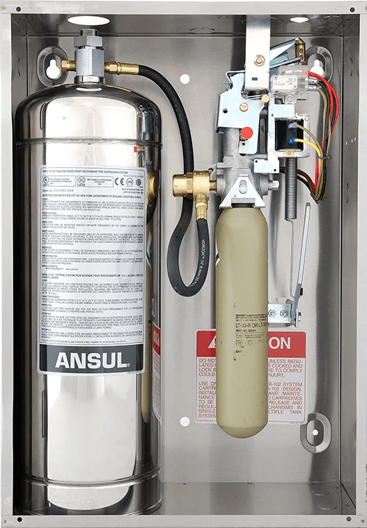 Ansul R-102 commercial kitchen fire suppression system components in a stainless steel enclosure